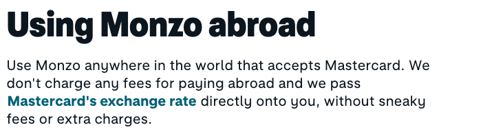 Monzo promotional copy highlighting that the card can be used abroad with no extra fees, using Mastercard’s exchange rate. Tone is clear, reassuring, and benefit-driven.