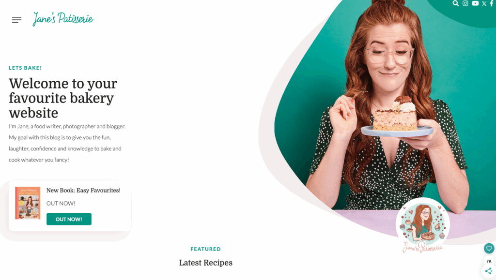Portrait of Jane Dunn, food blogger, smiling while holding a slice of cake, representing her approachable and personal blog brand.
